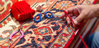 Expert carpet repair master restoring antique handwoven Turkish rug using traditional weaving techniques