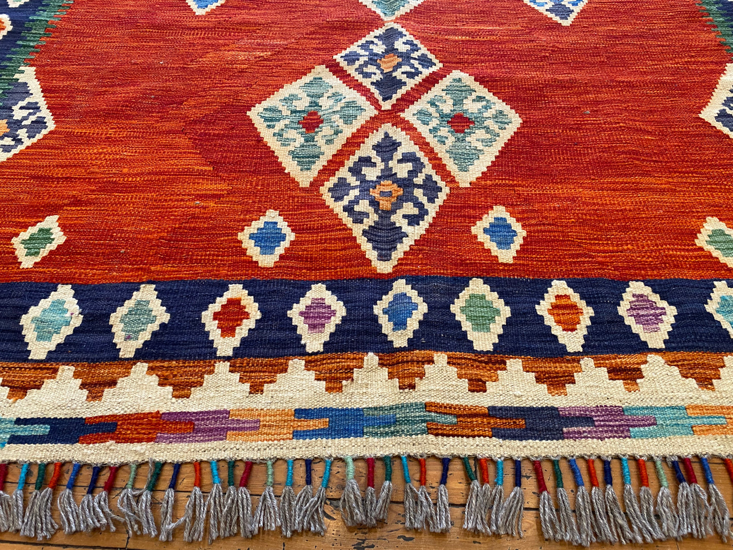 Handwoven Geometric Kilim Rug with Vibrant Tribal Patterns