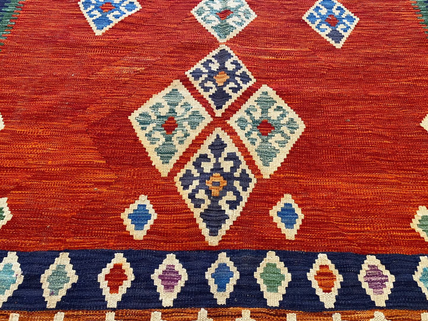 Handwoven Geometric Kilim Rug with Vibrant Tribal Patterns