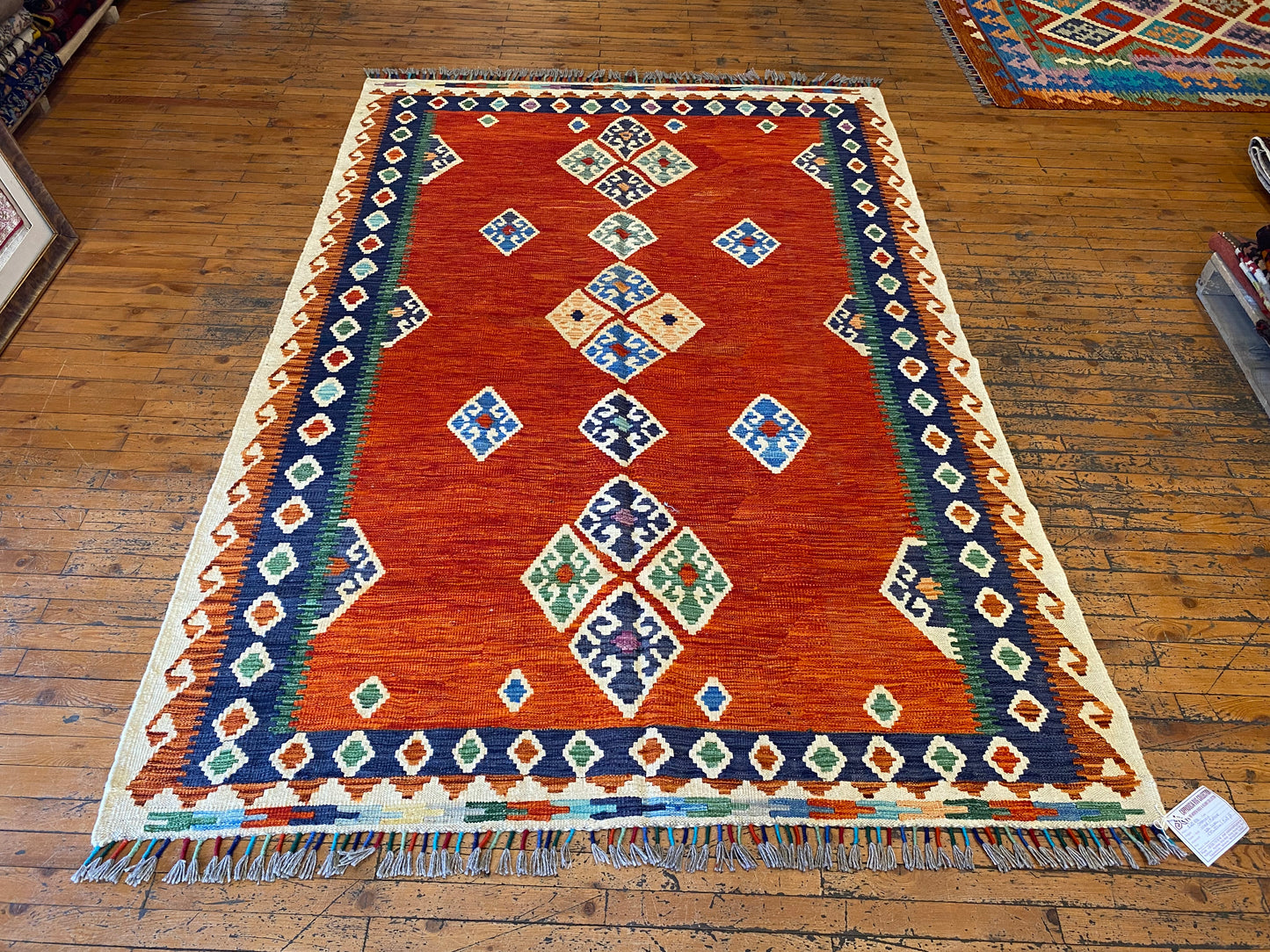 Handwoven Geometric Kilim Rug with Vibrant Tribal Patterns