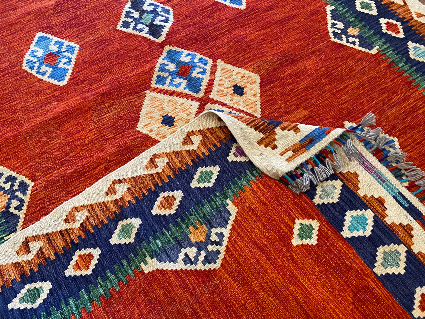 Handwoven Geometric Kilim Rug with Vibrant Tribal Patterns