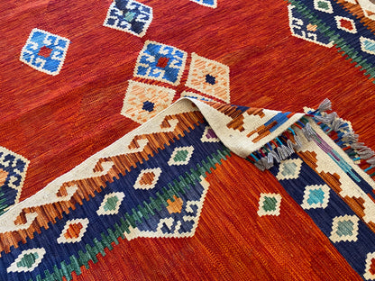 Handwoven Geometric Kilim Rug with Vibrant Tribal Patterns