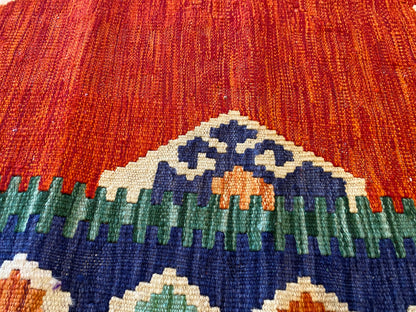Handwoven Geometric Kilim Rug with Vibrant Tribal Patterns