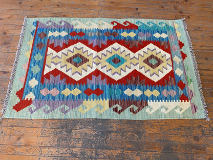 KILIM GEOMÉTRICO HECHO A MANO 3x5 pies
