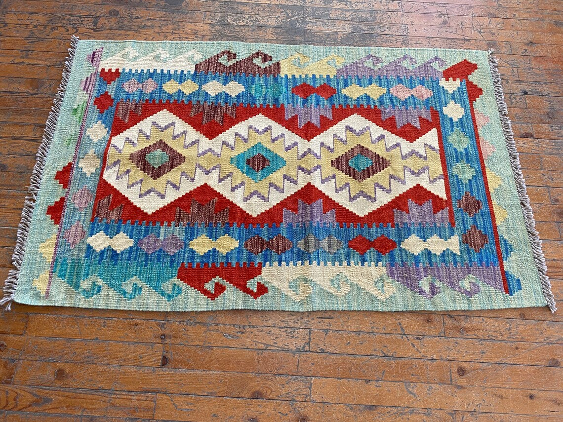 KILIM GEOMÉTRICO HECHO A MANO 3x5 pies
