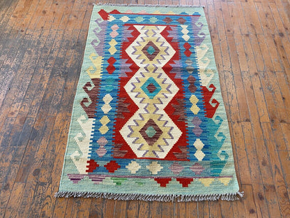 KILIM GEOMÉTRICO HECHO A MANO 3x5 pies