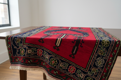 Red Geometric Rug Draped on Table